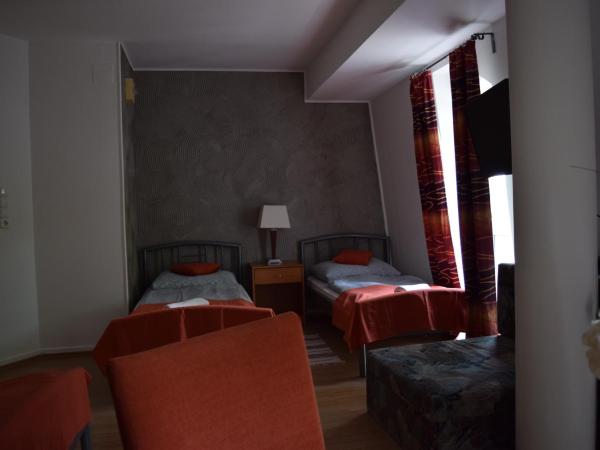 Belvárosi Panzió : photo 2 de la chambre chambre quadruple