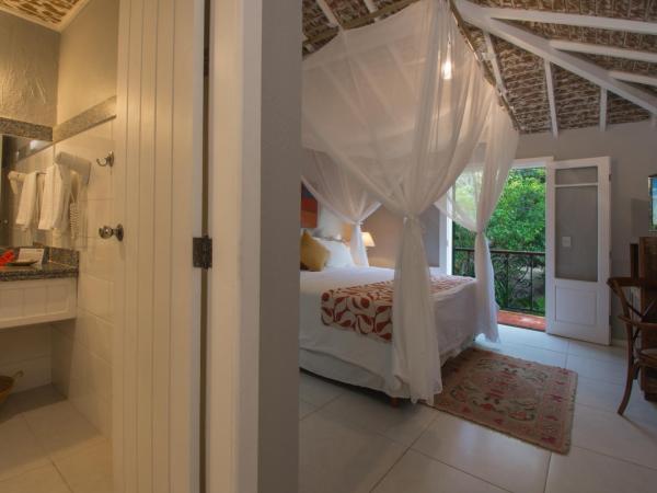 Pedra da Laguna Boutique Hotel SPA : photo 2 de la chambre chambre double deluxe - vue sur jardin