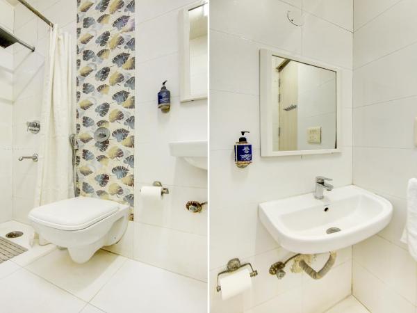 Treebo Rockwell Plaza : photo 9 de la chambre [sanitized] deluxe double room