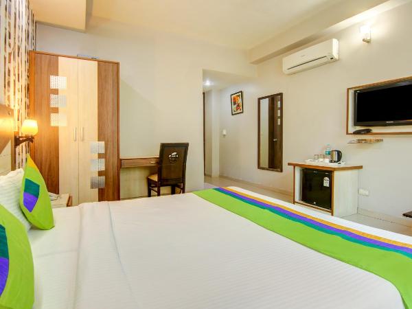 Treebo Rockwell Plaza : photo 3 de la chambre [sanitized] deluxe double room