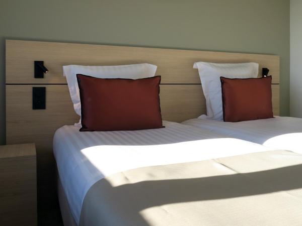 Hôtel Akena Troyes - La Chapelle St-Luc : photo 1 de la chambre chambre lits jumeaux