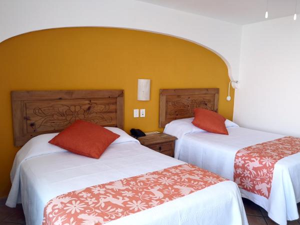 Hotel El Pescador : photo 10 de la chambre chambre double avec 2 lits doubles - vue sur océan