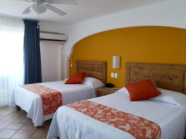 Hotel El Pescador : photo 8 de la chambre chambre double avec 2 lits doubles - vue sur océan