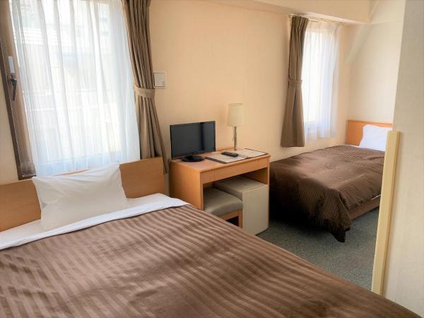 Sakura Hotel Hatagaya : photo 2 de la chambre chambre lits jumeaux