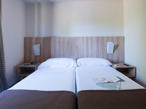 Albergue Monte Do Gozo : photo 6 de la chambre chambre lits jumeaux