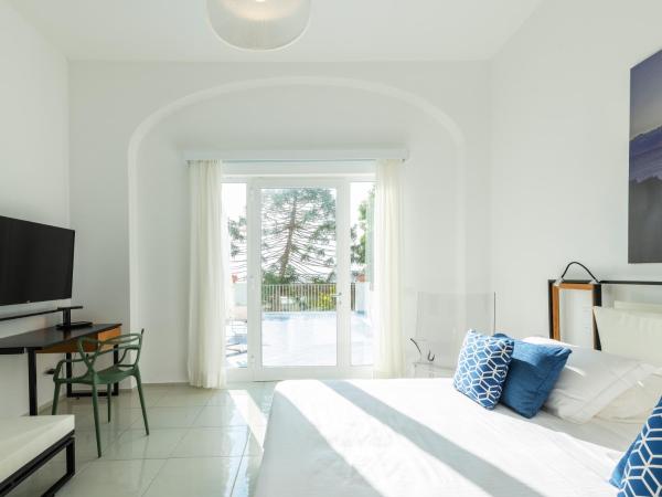 Apollon Club & Thermal Spa : photo 1 de la chambre chambre triple prestige avec terrasse et vue sur jardin