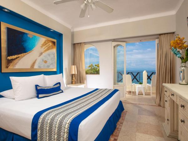 Blue Chairs Resort by the Sea - Adults Only : photo 2 de la chambre chambre deluxe - côté océan