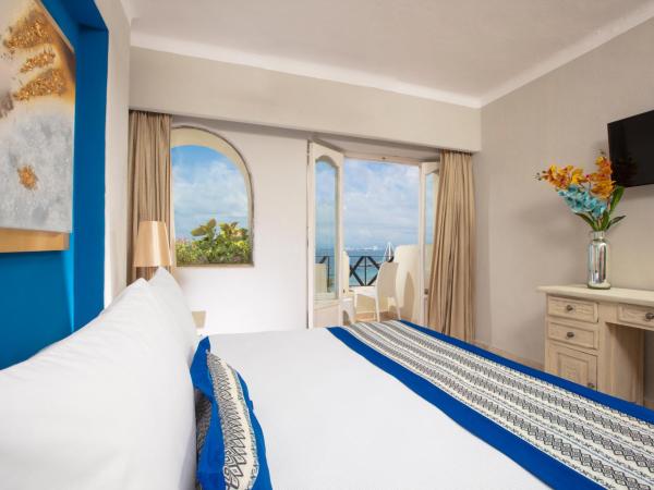 Blue Chairs Resort by the Sea - Adults Only : photo 1 de la chambre chambre deluxe - côté océan