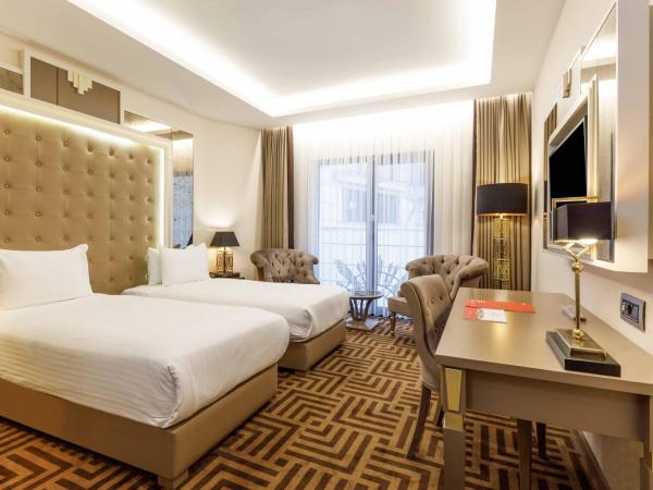 Ramada by Wyndham Istanbul Golden Horn : photo 5 de la chambre chambre lits jumeaux avec 2 lits simples