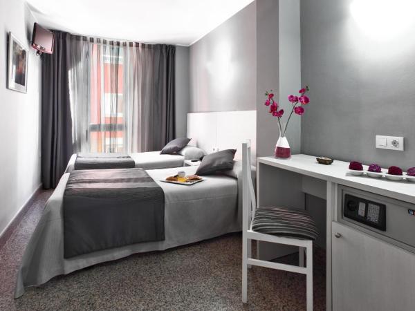 Hotel Nuevo Triunfo : photo 9 de la chambre chambre double ou lits jumeaux