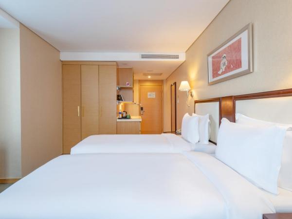 Regal Plaza Hotel & Residence : photo 3 de la chambre chambre lits jumeaux supérieure