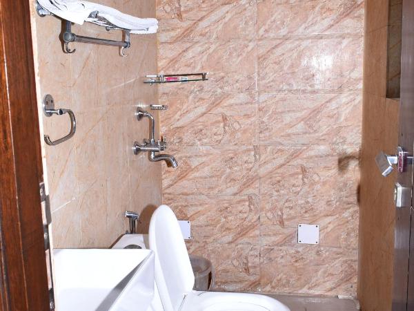 Hotel Flora Inn : photo 2 de la chambre chambre deluxe (1 adulte + 2 enfants)