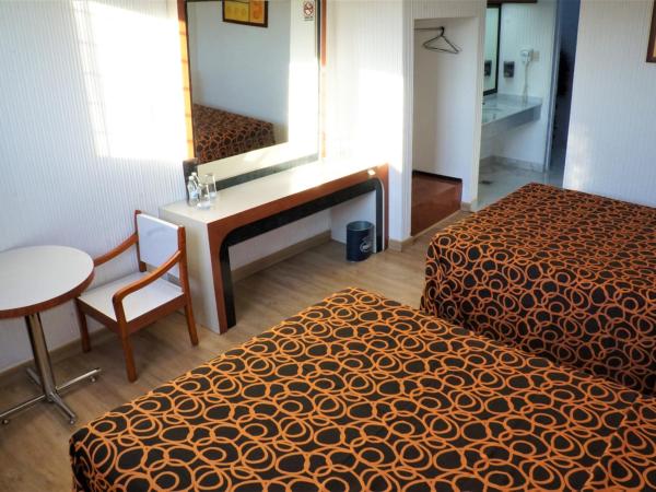 Hotel Princesa : photo 5 de la chambre chambre lits jumeaux