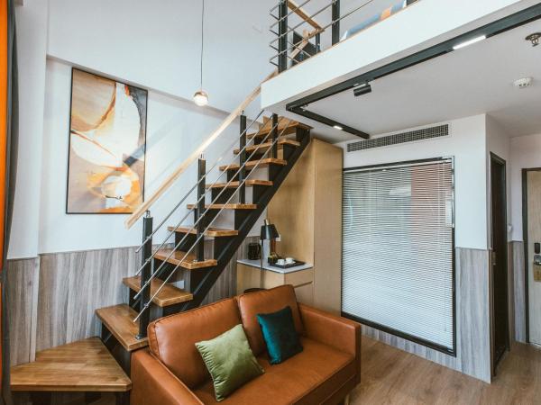 Shanghai Fish Inn People Square : photo 3 de la chambre suite en duplex