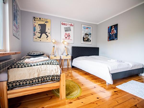 HydroZagadka Kołobrzeg : photo 2 de la chambre chambre lit queen-size avec balcon