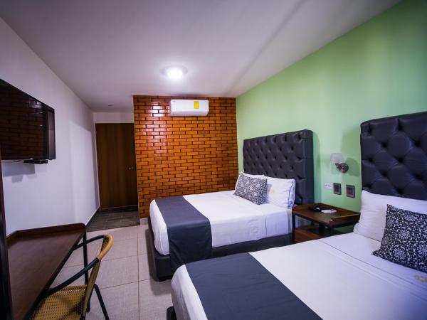 Hotel Jar8 Acuario enfrente al Acuario de Veracruz : photo 1 de la chambre chambre double supérieure avec deux lits doubles