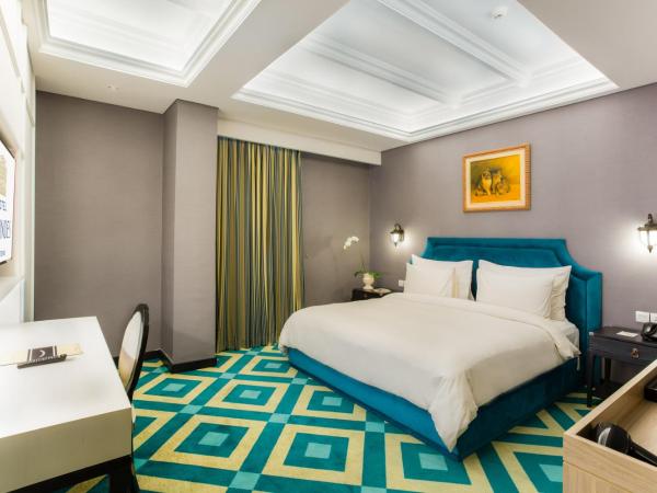 Hotel Des Indes Menteng : photo 6 de la chambre chambre lit king-size exécutive