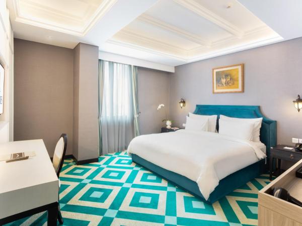 Hotel Des Indes Menteng : photo 5 de la chambre chambre lit king-size exécutive