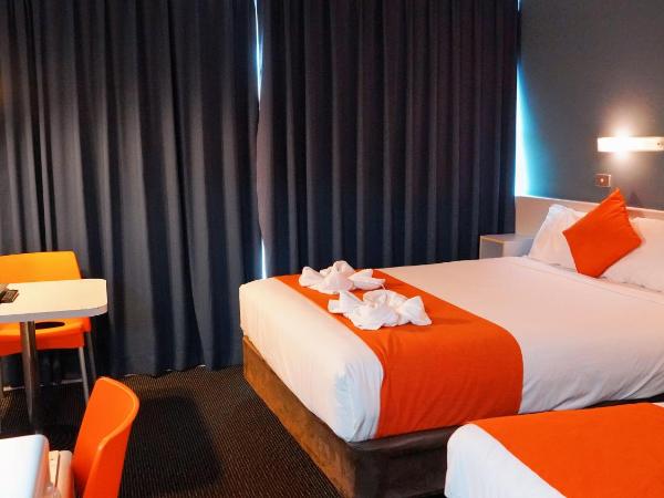 Waterfront Lodge Motel : photo 9 de la chambre chambre double deluxe avec lit d'appoint