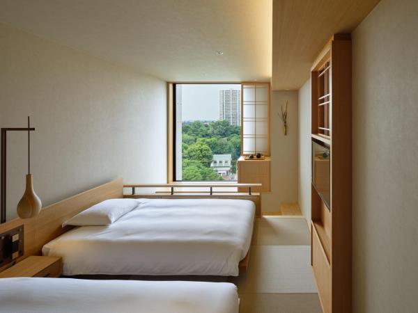 ONSEN RYOKAN Yuen Sapporo : photo 1 de la chambre chambre lits jumeaux avec douche - Étage supérieur - non-fumeurs