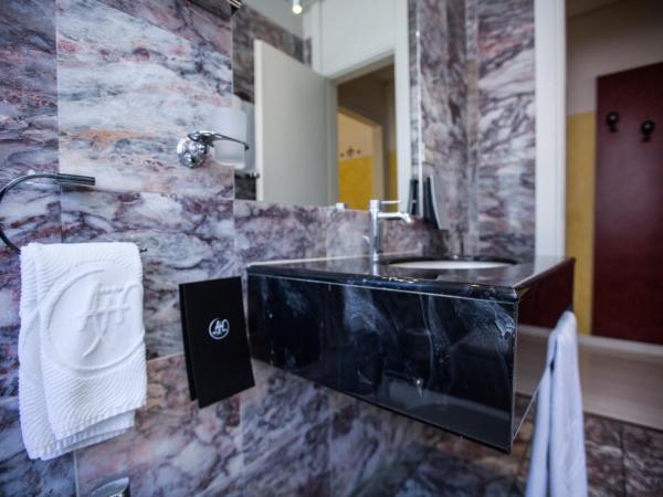 Agape Hotel AA Hotels : photo 4 de la chambre chambre triple