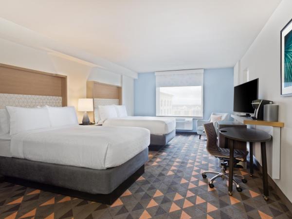 Holiday Inn & Suites Across From Universal Orlando, an IHG Hotel : photo 1 de la chambre chambre double premium avec 2 lits doubles