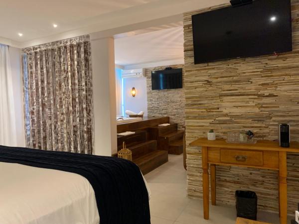 Hotel Pousada Experience João Fernandes : photo 2 de la chambre master suite with hot tub (2 adults)