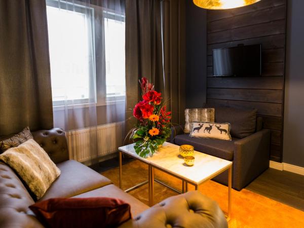 Hotel Golden Circle Suites : photo 2 de la chambre suite de luxe avec sauna