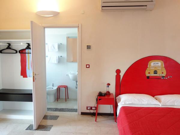 Euromotel Croce Bianca : photo 3 de la chambre chambre au thème familial