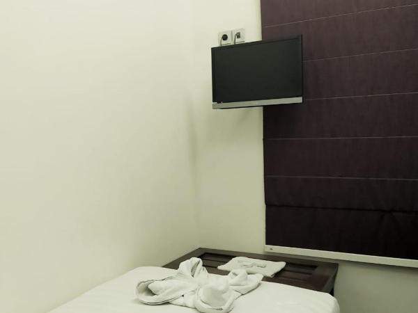 Omah Qu Guesthouse Malioboro : photo 10 de la chambre chambre simple standard avec salle de bains commune