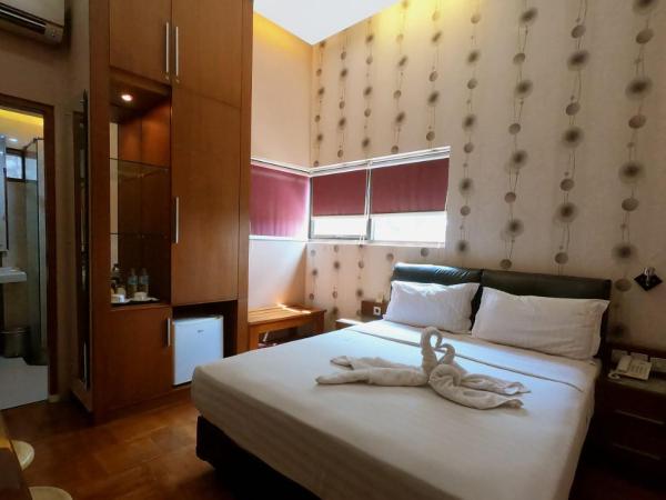 Omah Qu Guesthouse Malioboro : photo 9 de la chambre chambre double ou lits jumeaux supérieure