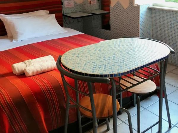 Villa Arazurrina : photo 1 de la chambre chambre triple avec salle de bains privative