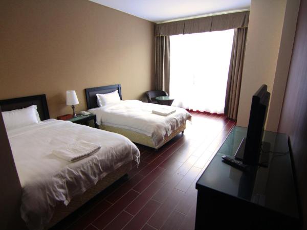 Putatan Platinum Hotel : photo 1 de la chambre chambre lits jumeaux deluxe