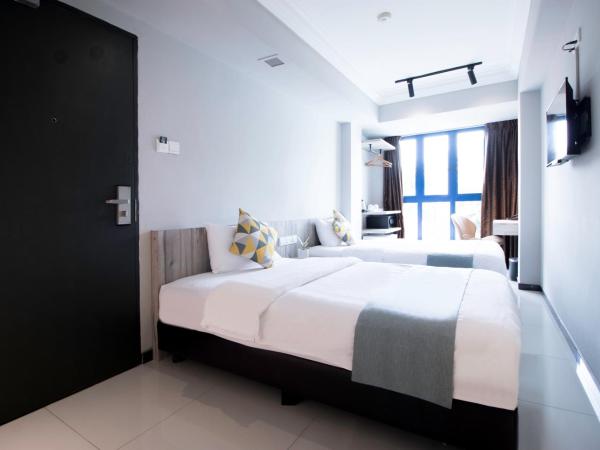 Harbour Ville Hotel : photo 2 de la chambre chambre lits jumeaux supérieure - récemment rénovée