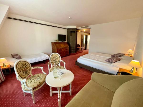 Hotel Monopol Luzern : photo 1 de la chambre chambre quadruple