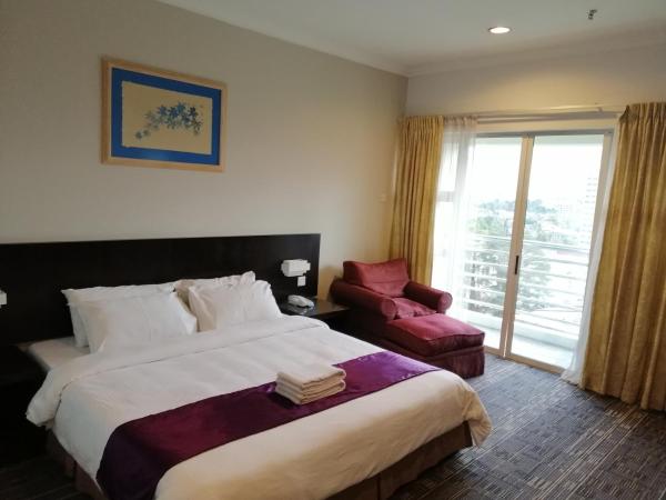 StayInn Gateway Hotel Apartment : photo 3 de la chambre chambre lit king-size standard