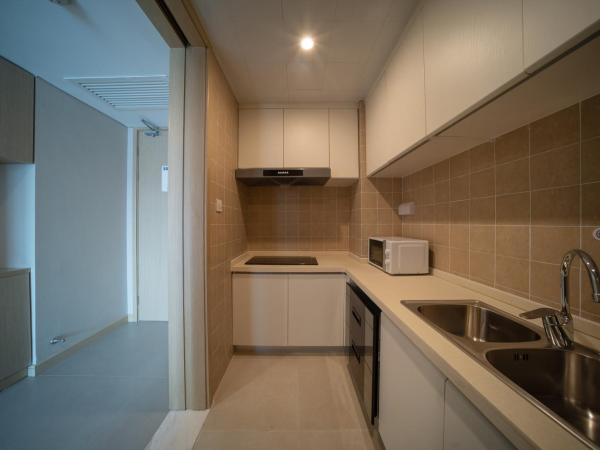 Holiday Inn Express Qingdao Innovation Park, an IHG Hotel : photo 6 de la chambre suite 1 chambre lit king-size