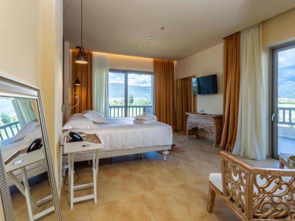 Elysian Luxury Hotel and Spa : photo 7 de la chambre chambre double ou lits jumeaux deluxe – vue sur jardin