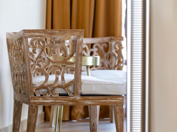 Elysian Luxury Hotel and Spa : photo 9 de la chambre chambre double ou lits jumeaux deluxe – vue sur jardin