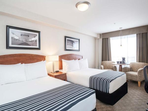 Sandman Hotel & Suites Calgary West : photo 1 de la chambre chambre standard avec 2 lits doubles