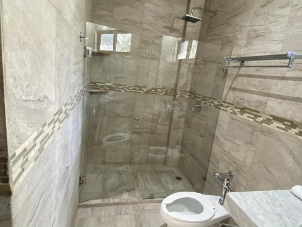 Cuxos Hotel Beachfront : photo 8 de la chambre chambre lit king-size - vue sur mer