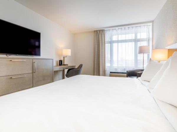 Repotel Henri IV Québec : photo 3 de la chambre chambre lit king-size deluxe