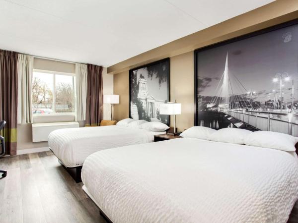 Super 8 by Wyndham Winnipeg West : photo 3 de la chambre chambre de luxe avec 2 lits queen-size - animaux domestiques acceptés