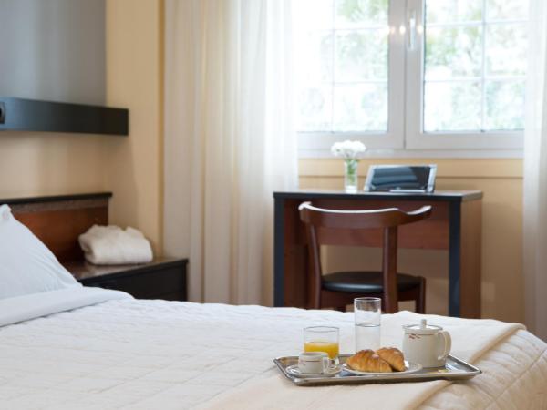 Victory Inn : photo 8 de la chambre petite chambre double