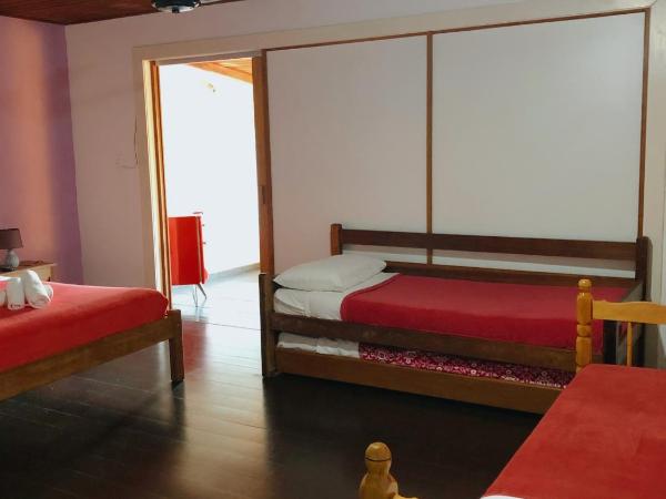 Anexo Aldeia Búzios : photo 6 de la chambre chambre quadruple