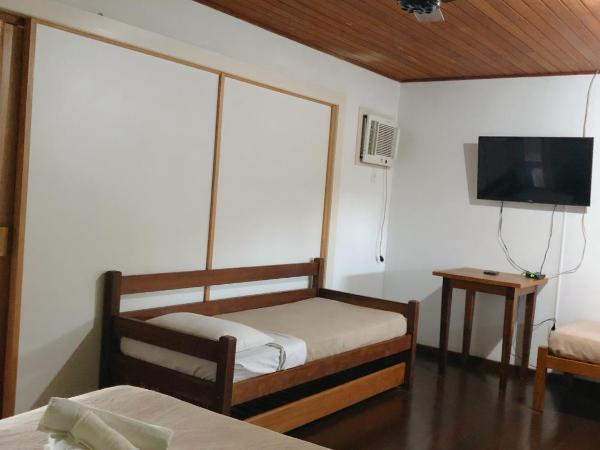 Anexo Aldeia Búzios : photo 4 de la chambre chambre quadruple