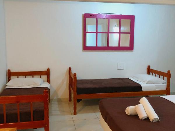 Anexo Aldeia Búzios : photo 2 de la chambre chambre quadruple