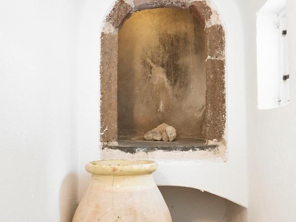 Atrina Canava 1894 : photo 5 de la chambre suite lune de miel avec bain à remous - vue sur caldera