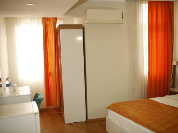 Özhan Hotel : photo 4 de la chambre chambre double ou lits jumeaux standard