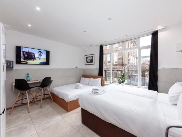 Argyle Apart Hotel : photo 1 de la chambre appartements super familiaux